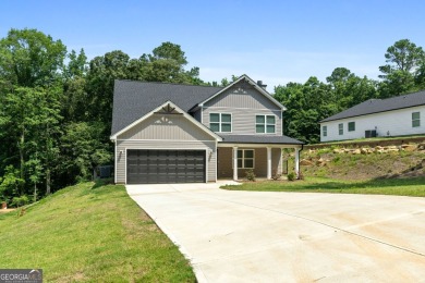 Discover this stunning 3-bedroom, 2.5-bath home with a spacious on Turtle Cove Golf Course in Georgia - for sale on GolfHomes.com, golf home, golf lot