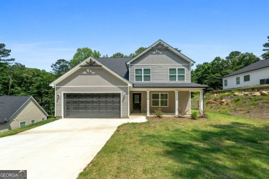 Discover this stunning 3-bedroom, 2.5-bath home with a spacious on Turtle Cove Golf Course in Georgia - for sale on GolfHomes.com, golf home, golf lot