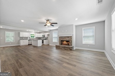 Discover this stunning 3-bedroom, 2.5-bath home with a spacious on Turtle Cove Golf Course in Georgia - for sale on GolfHomes.com, golf home, golf lot
