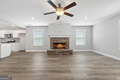 Discover this stunning 3-bedroom, 2.5-bath home with a spacious on Turtle Cove Golf Course in Georgia - for sale on GolfHomes.com, golf home, golf lot