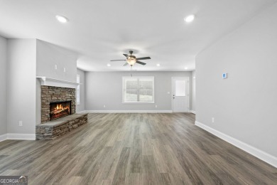 Discover this stunning 3-bedroom, 2.5-bath home with a spacious on Turtle Cove Golf Course in Georgia - for sale on GolfHomes.com, golf home, golf lot