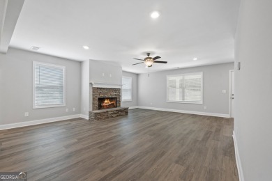 Discover this stunning 3-bedroom, 2.5-bath home with a spacious on Turtle Cove Golf Course in Georgia - for sale on GolfHomes.com, golf home, golf lot