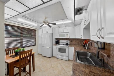 PRICED TO SELL!! INCREDIBLE VALUE ON THIS PARTIALLY RENOVATED on Wynmoor Golf Course in Florida - for sale on GolfHomes.com, golf home, golf lot