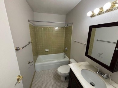 Spacious 2 bedroon, 2 bath upper level Condominium with Golf on Tuckaway Country Club in Wisconsin - for sale on GolfHomes.com, golf home, golf lot