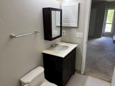 Spacious 2 bedroon, 2 bath upper level Condominium with Golf on Tuckaway Country Club in Wisconsin - for sale on GolfHomes.com, golf home, golf lot
