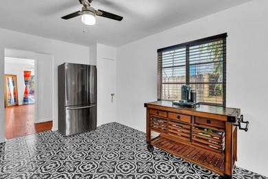 Welcome to your slice of Old Florida charm! This quaint concrete on Lake Worth Municipal Golf Course in Florida - for sale on GolfHomes.com, golf home, golf lot