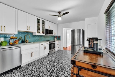 Welcome to your slice of Old Florida charm! This quaint concrete on Lake Worth Municipal Golf Course in Florida - for sale on GolfHomes.com, golf home, golf lot