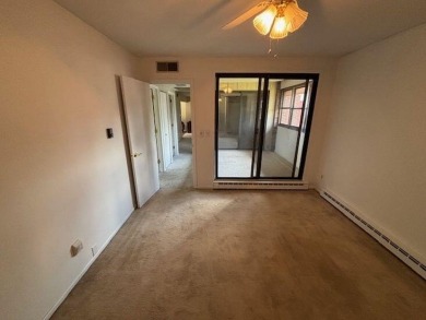 Spacious 2 bedroon, 2 bath upper level Condominium with Golf on Tuckaway Country Club in Wisconsin - for sale on GolfHomes.com, golf home, golf lot