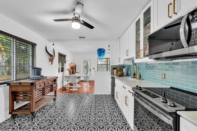 Welcome to your slice of Old Florida charm! This quaint concrete on Lake Worth Municipal Golf Course in Florida - for sale on GolfHomes.com, golf home, golf lot