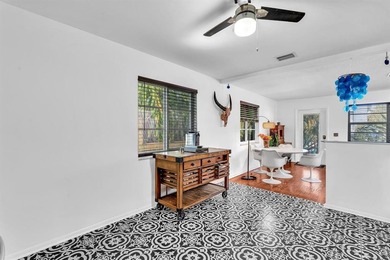 Welcome to your slice of Old Florida charm! This quaint concrete on Lake Worth Municipal Golf Course in Florida - for sale on GolfHomes.com, golf home, golf lot