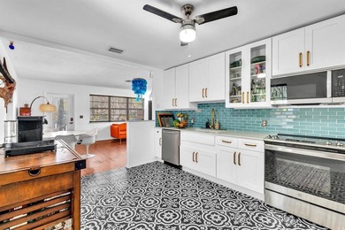 Welcome to your slice of Old Florida charm! This quaint concrete on Lake Worth Municipal Golf Course in Florida - for sale on GolfHomes.com, golf home, golf lot