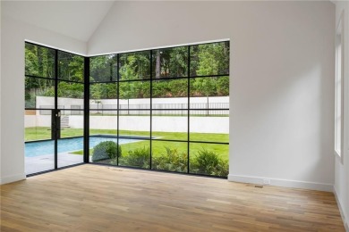 Located in the heart of the sought-after Chastain Park on North Fulton Golf Course in Georgia - for sale on GolfHomes.com, golf home, golf lot