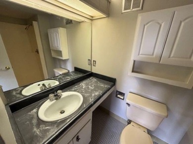 Spacious 2 bedroon, 2 bath upper level Condominium with Golf on Tuckaway Country Club in Wisconsin - for sale on GolfHomes.com, golf home, golf lot