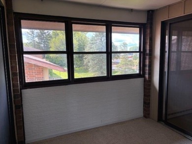 Spacious 2 bedroon, 2 bath upper level Condominium with Golf on Tuckaway Country Club in Wisconsin - for sale on GolfHomes.com, golf home, golf lot
