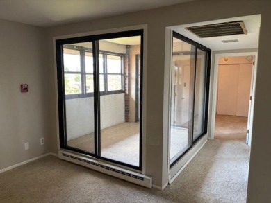 Spacious 2 bedroon, 2 bath upper level Condominium with Golf on Tuckaway Country Club in Wisconsin - for sale on GolfHomes.com, golf home, golf lot