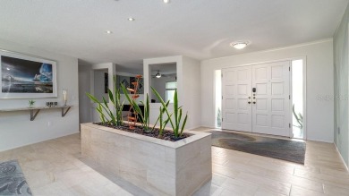 Finally, an updated POOL home in the NON-DEED RESTRICTED on Palm Aire Country Club of Sarasota in Florida - for sale on GolfHomes.com, golf home, golf lot