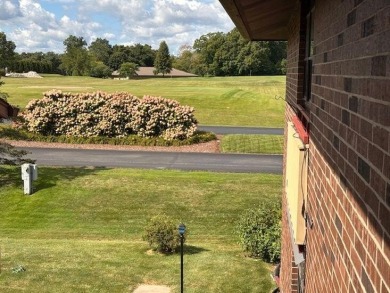 Spacious 2 bedroon, 2 bath upper level Condominium with Golf on Tuckaway Country Club in Wisconsin - for sale on GolfHomes.com, golf home, golf lot
