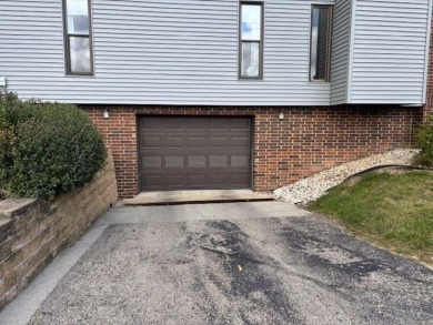 Spacious 2 bedroon, 2 bath upper level Condominium with Golf on Tuckaway Country Club in Wisconsin - for sale on GolfHomes.com, golf home, golf lot