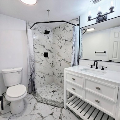 Best price in town for a Fully Remodeled Condo @ Villas Caprie on Largo Golf Course in Florida - for sale on GolfHomes.com, golf home, golf lot