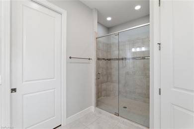 FULL GOLF MEMBERSHIP is included with this meticulous and on Esplanade Golf and  Country Club in Florida - for sale on GolfHomes.com, golf home, golf lot