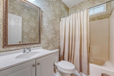 An Elegant Family Home in a Prestigious Gated Community on Dunes West Golf Club in South Carolina - for sale on GolfHomes.com, golf home, golf lot