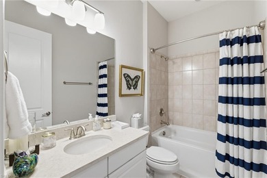 FULL GOLF MEMBERSHIP is included with this meticulous and on Esplanade Golf and  Country Club in Florida - for sale on GolfHomes.com, golf home, golf lot