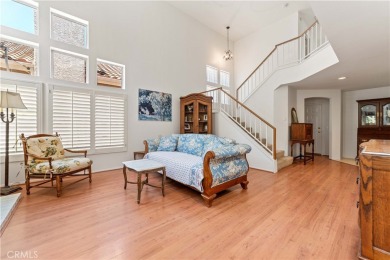 Turquoise double doors welcome you to this cheery 2 story on Wood Ranch Golf Club in California - for sale on GolfHomes.com, golf home, golf lot