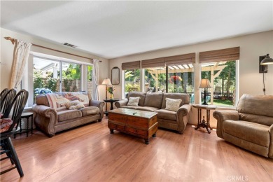 Turquoise double doors welcome you to this cheery 2 story on Wood Ranch Golf Club in California - for sale on GolfHomes.com, golf home, golf lot