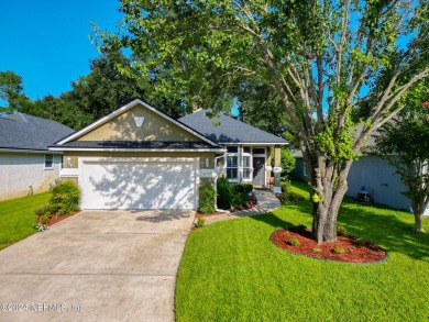 Welcome Home. The Windsor Park Golf Club surrounds this serene on Windsor Parke Golf Club in Florida - for sale on GolfHomes.com, golf home, golf lot