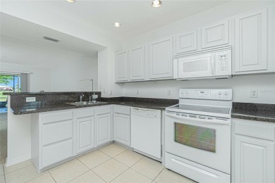 26396 Nadir Rd Townhouse #507  FURNISHED with a designer's touch on Deep Creek Golf Club in Florida - for sale on GolfHomes.com, golf home, golf lot