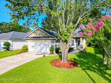 Welcome Home. The Windsor Park Golf Club surrounds this serene on Windsor Parke Golf Club in Florida - for sale on GolfHomes.com, golf home, golf lot