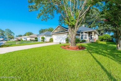 Welcome Home. The Windsor Park Golf Club surrounds this serene on Windsor Parke Golf Club in Florida - for sale on GolfHomes.com, golf home, golf lot