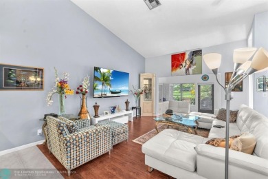 WELCOME TO 5628 PLEASANT VALLEY LANE -- A SERENE RETREAT NESTLED on Boca Delray Golf and Country Club in Florida - for sale on GolfHomes.com, golf home, golf lot