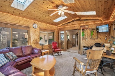 A 4-bedroom, 3 bath, 2-story with an 18x36 in-ground swimming on Bunker Hills Golf Course in Minnesota - for sale on GolfHomes.com, golf home, golf lot