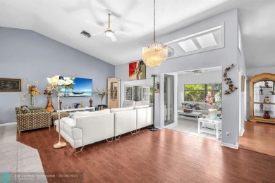 WELCOME TO 5628 PLEASANT VALLEY LANE -- A SERENE RETREAT NESTLED on Boca Delray Golf and Country Club in Florida - for sale on GolfHomes.com, golf home, golf lot