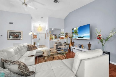 WELCOME TO 5628 PLEASANT VALLEY LANE -- A SERENE RETREAT NESTLED on Boca Delray Golf and Country Club in Florida - for sale on GolfHomes.com, golf home, golf lot