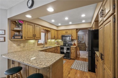 A 4-bedroom, 3 bath, 2-story with an 18x36 in-ground swimming on Bunker Hills Golf Course in Minnesota - for sale on GolfHomes.com, golf home, golf lot