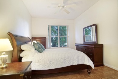 Relax looking out of this wide lake view in this freshly painted on St. Lucie Trail Golf Club in Florida - for sale on GolfHomes.com, golf home, golf lot