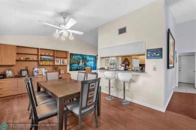 WELCOME TO 5628 PLEASANT VALLEY LANE -- A SERENE RETREAT NESTLED on Boca Delray Golf and Country Club in Florida - for sale on GolfHomes.com, golf home, golf lot