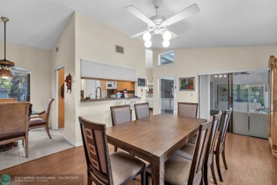 WELCOME TO 5628 PLEASANT VALLEY LANE -- A SERENE RETREAT NESTLED on Boca Delray Golf and Country Club in Florida - for sale on GolfHomes.com, golf home, golf lot