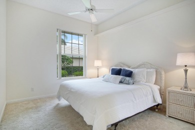 Relax looking out of this wide lake view in this freshly painted on St. Lucie Trail Golf Club in Florida - for sale on GolfHomes.com, golf home, golf lot
