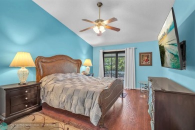WELCOME TO 5628 PLEASANT VALLEY LANE -- A SERENE RETREAT NESTLED on Boca Delray Golf and Country Club in Florida - for sale on GolfHomes.com, golf home, golf lot