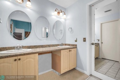 WELCOME TO 5628 PLEASANT VALLEY LANE -- A SERENE RETREAT NESTLED on Boca Delray Golf and Country Club in Florida - for sale on GolfHomes.com, golf home, golf lot