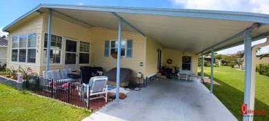 Come settle down and relax in a beautiful manufactured home with on Fairways Country Club in Florida - for sale on GolfHomes.com, golf home, golf lot