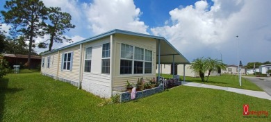 Come settle down and relax in a beautiful manufactured home with on Fairways Country Club in Florida - for sale on GolfHomes.com, golf home, golf lot