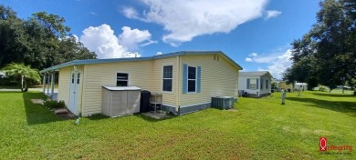 Come settle down and relax in a beautiful manufactured home with on Fairways Country Club in Florida - for sale on GolfHomes.com, golf home, golf lot