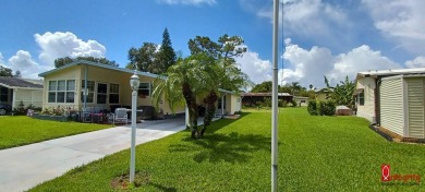 Come settle down and relax in a beautiful manufactured home with on Fairways Country Club in Florida - for sale on GolfHomes.com, golf home, golf lot