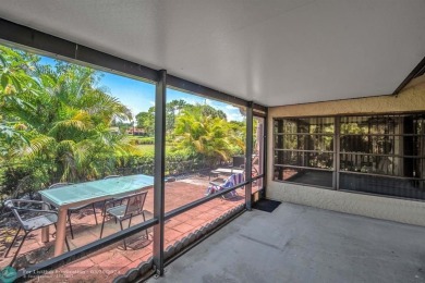 WELCOME TO 5628 PLEASANT VALLEY LANE -- A SERENE RETREAT NESTLED on Boca Delray Golf and Country Club in Florida - for sale on GolfHomes.com, golf home, golf lot