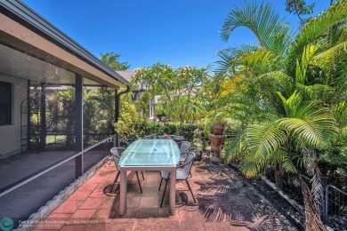WELCOME TO 5628 PLEASANT VALLEY LANE -- A SERENE RETREAT NESTLED on Boca Delray Golf and Country Club in Florida - for sale on GolfHomes.com, golf home, golf lot