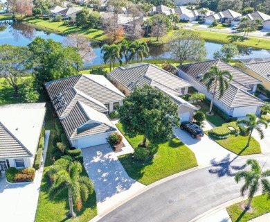 Relax looking out of this wide lake view in this freshly painted on St. Lucie Trail Golf Club in Florida - for sale on GolfHomes.com, golf home, golf lot